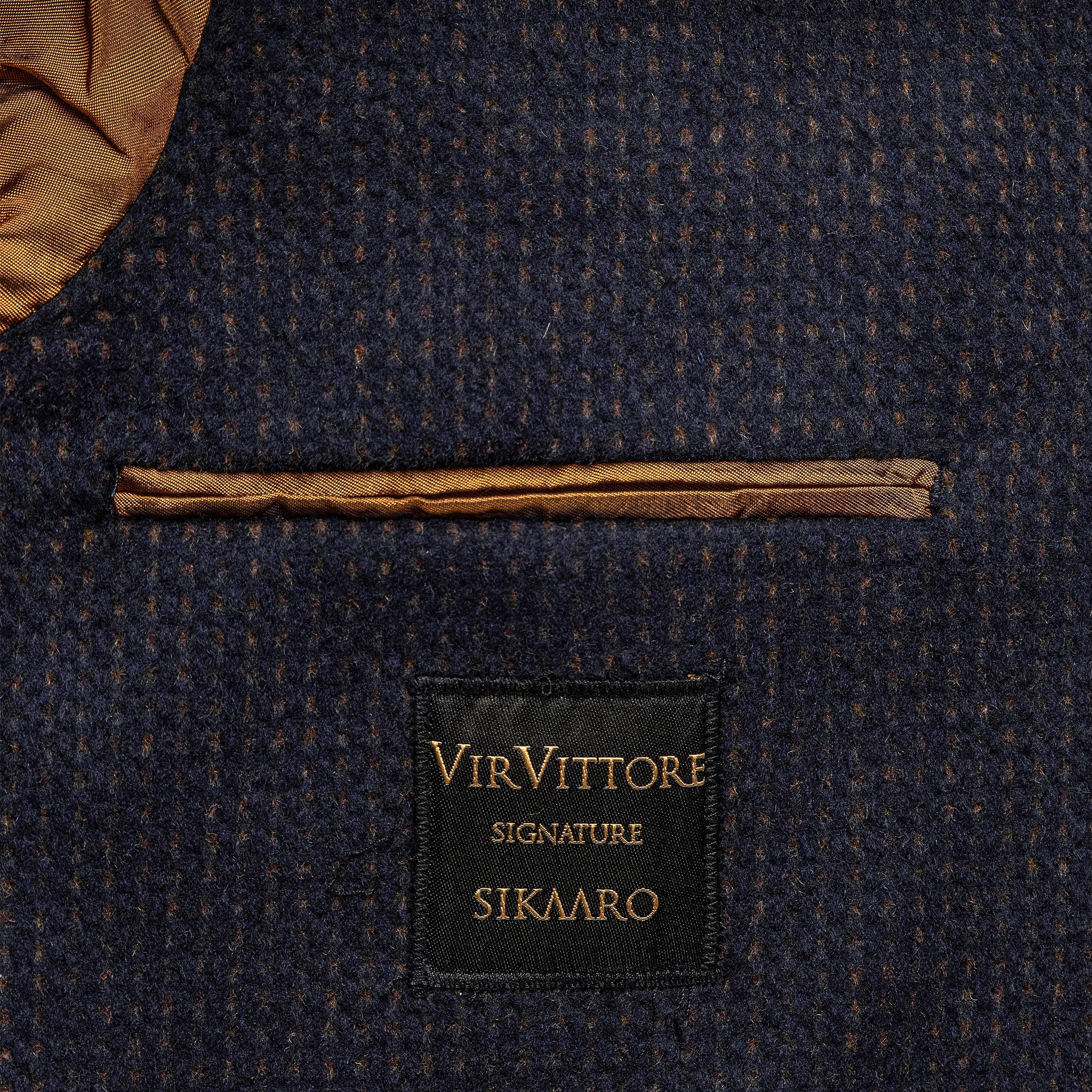 men's blue blazer with elbow patches